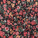 Floral pattern fabric with colorful flowers on a black background