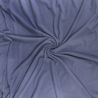 Close-up of blue fabric with a swirl pattern