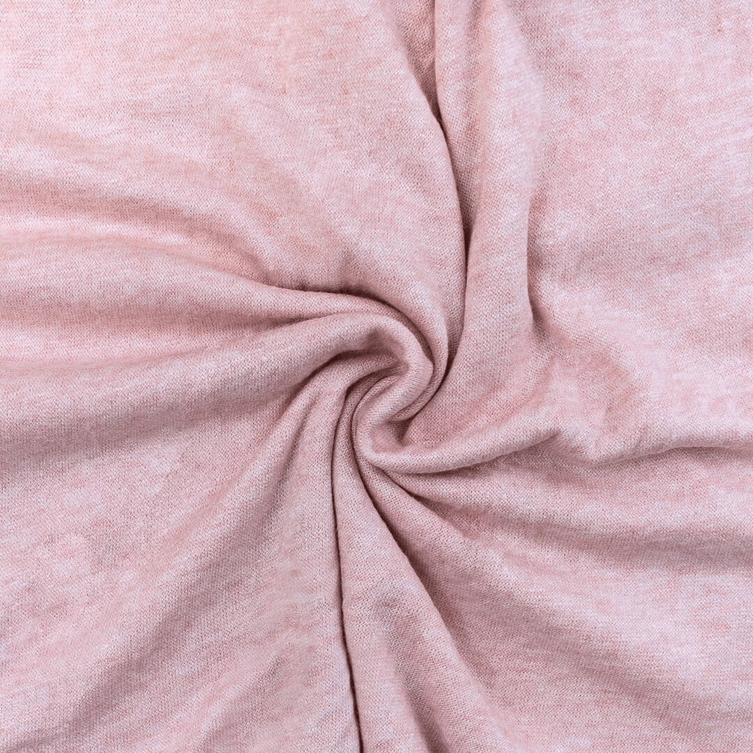 Close-up of pink fabric with a swirl pattern