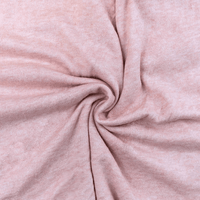 Close-up of pink fabric with a swirl pattern