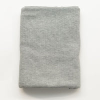 Folded gray fabric on a white background