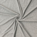 Close-up of gray fabric with a swirl pattern