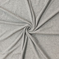 Close-up of gray fabric with a swirl pattern