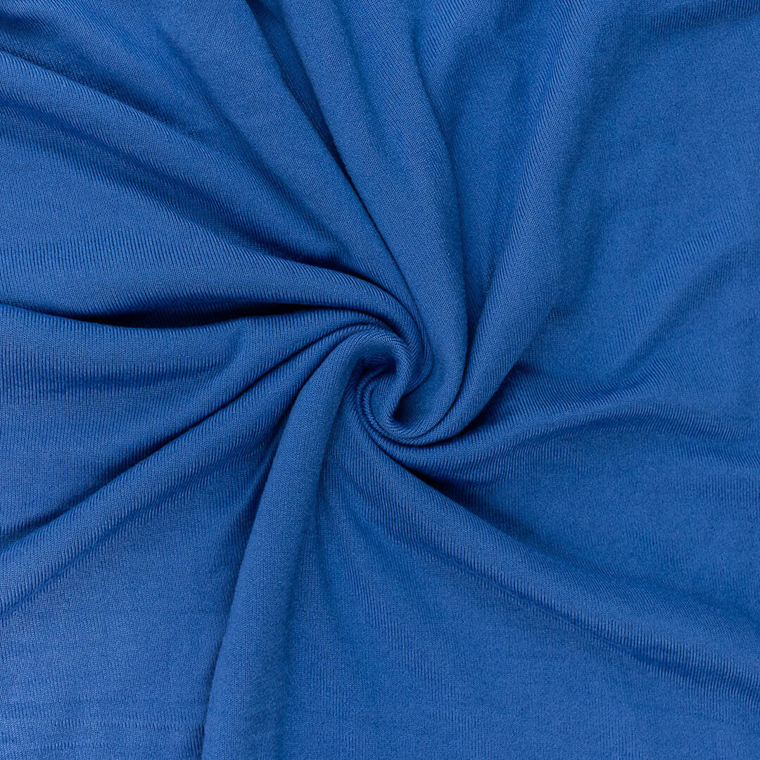 Close-up of blue sweater fabric in a swirl pattern