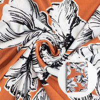 Orange Floral Fabric in Swirl pattern