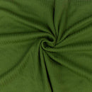 Close-up of green fabric with a swirl pattern