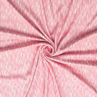 Pink fabric with a swirling pattern