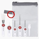 Set of tools with a clear mesh pouch and gray zipper, featuring a brand logo.