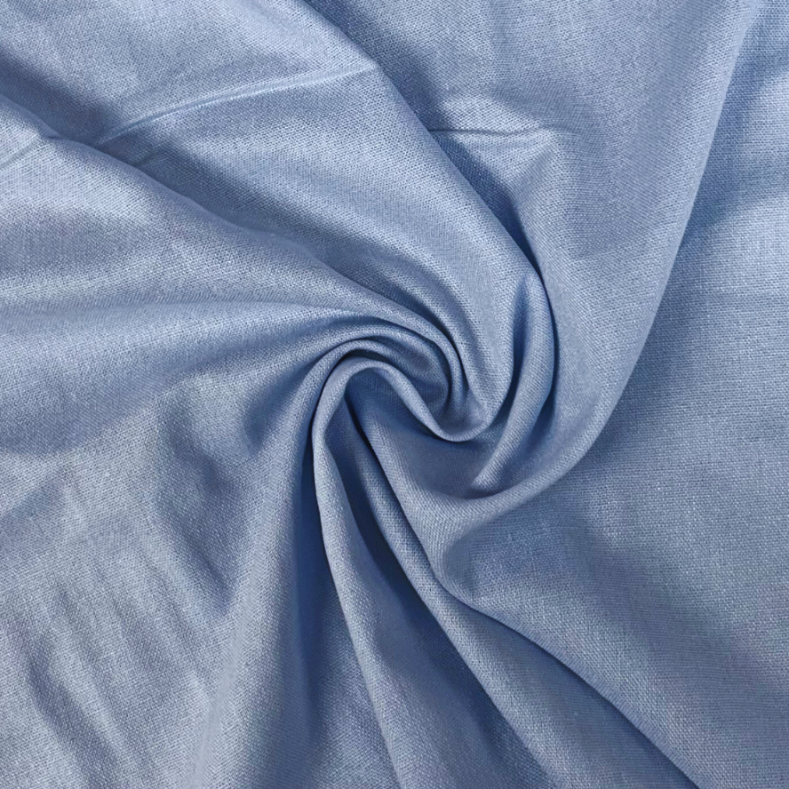 Close-up of blue fabric with a swirl pattern