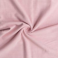 Close-up of pink fabric with a swirl pattern