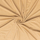 Close-up of beige fabric with a swirl pattern