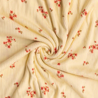 Fabric with floral pattern and ribbed texture