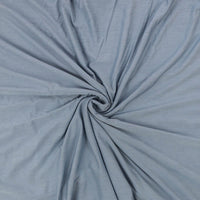 Slate blue bamboo spandex jersey knit fabric in a swirl