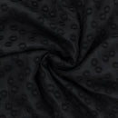 Black jacquard dot fabric in a swirl
