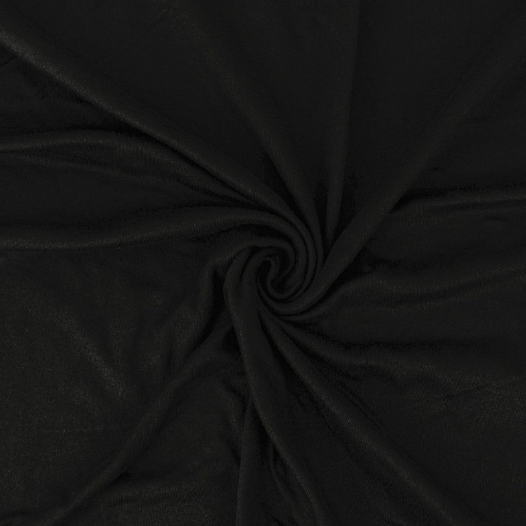 Close-up of black fabric with a swirl pattern