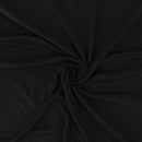 Close-up of black fabric with a swirl pattern