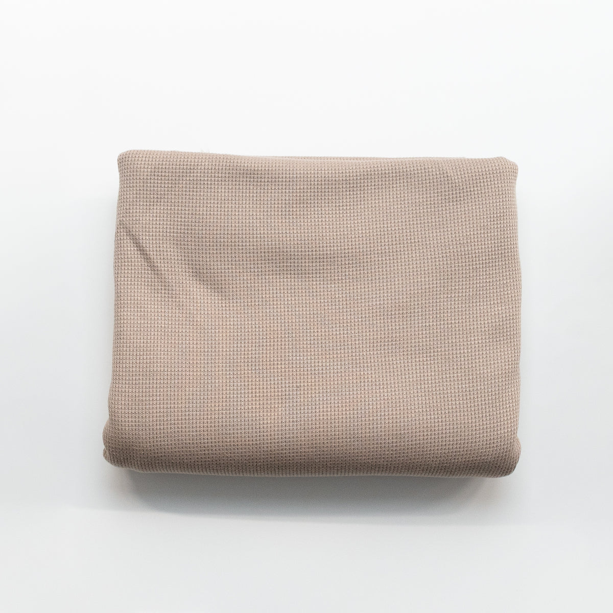 Fawn thermal waffle knit fabric, folded