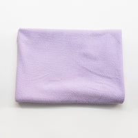 Lilac textured knit fabric, folded