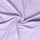 Lilac textured knit fabric in a swirl