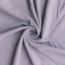 Close-up of gray fabric with a swirl pattern