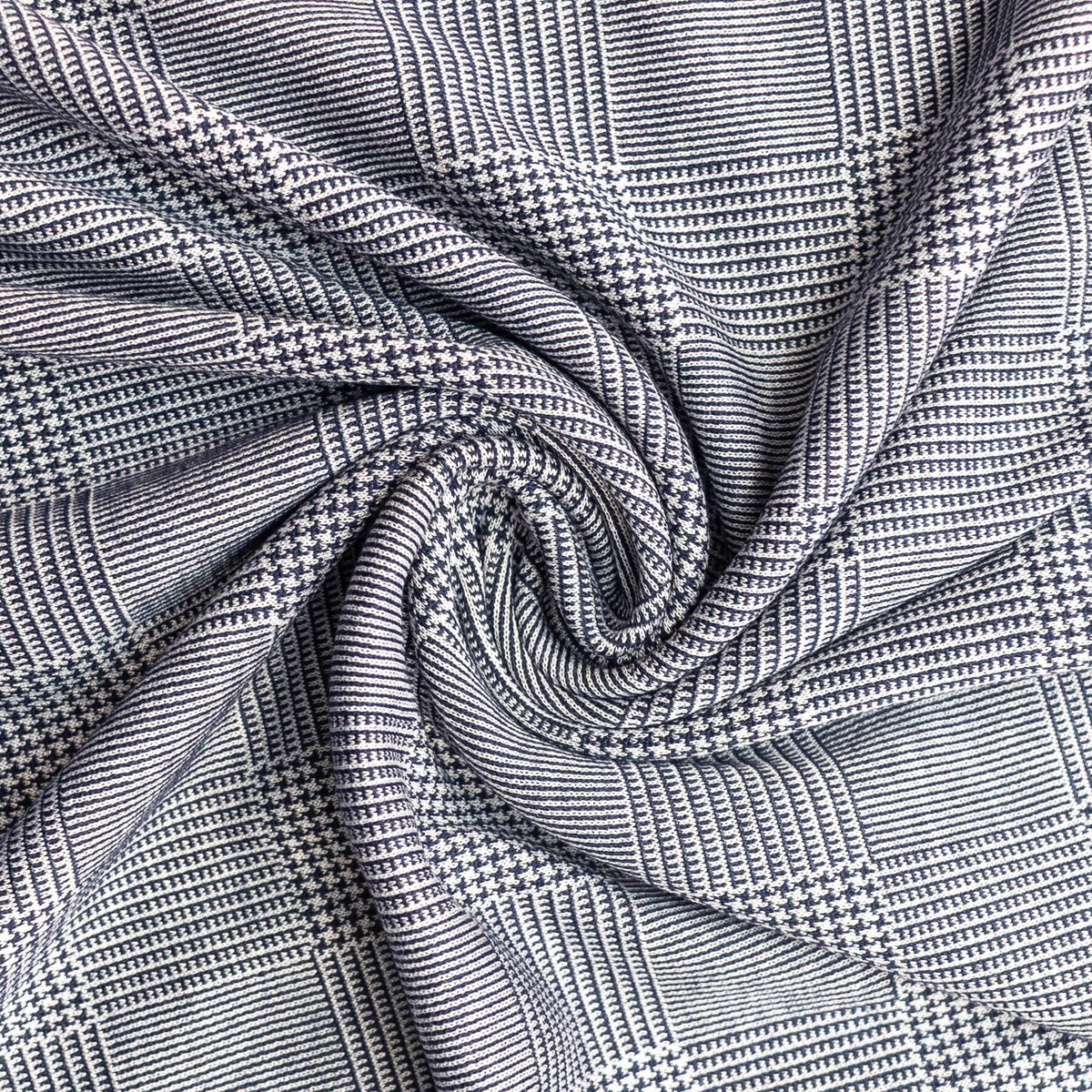 Navy plaid double knit option for the Vail Dress, shown in a swirl